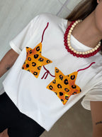 Camiseta con estrellas animal print