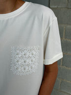 Camiseta bolsillo perlas