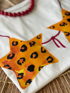 Camiseta con estrellas animal print